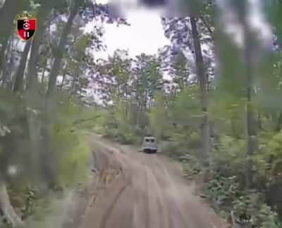 Ukrainian fiber-optic FPV drone of the 2nd Battalion of the 30th Mechanized Brigade followed a Russian van trough a small forest and then hit the driver cabin. Soledar direction. 01.10.2025
