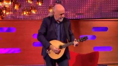 Bill Bailey wows the guests and the audience with an Irish jig on a mandola he learned in lockdown.