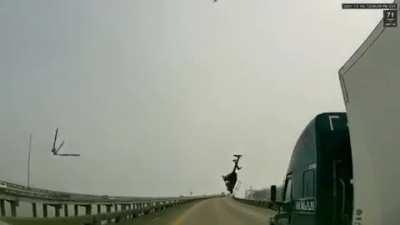 Helicopter crashes after clipping power line on bridge over I-10 near New Orleans. 12/14/21