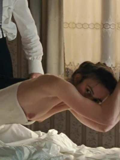 Keira Knightley getting spanked with her tits out