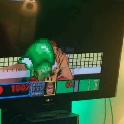 My kid showing me Doom Punch Out.