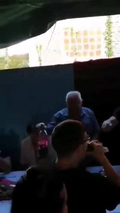 Chad Serb throws a Whole pig