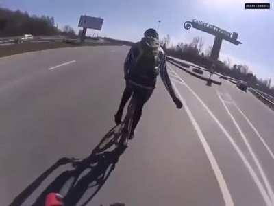 To ride a bike on the highway