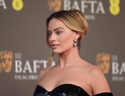 Margot attends the EE BAFTA Film Awards 2024 at The Royal Festival Hall in London - February 2024