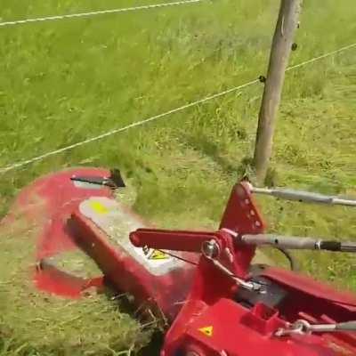 Mower that doesn't leave grass around posts