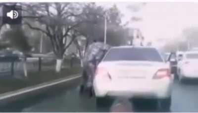 In Kazakhstan, a man caught his wife cheating on him, tied her to his car as punishment, and dragged her around town