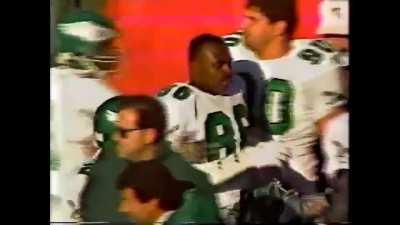 [Highlight] Randall Cunningham dodges a Bruce Smith sack in the endzone and chucks it way downfield for a 95 yard TD (1990)