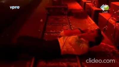 Alex almost being hit by a train during Lowlands Festival 2016