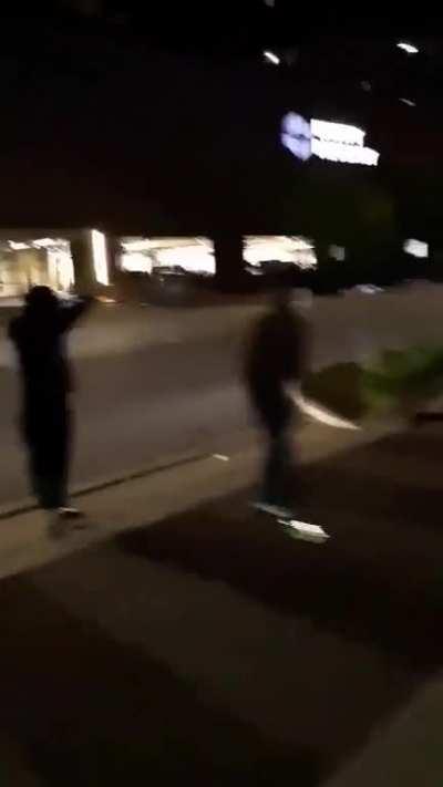 Protestors in Indianapolis get into a fight amongst eachother and gunshots ring out