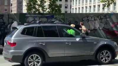 A woman and reporter assaulted by commies thugs in peaceful rally supporting law enforcement in seattle.