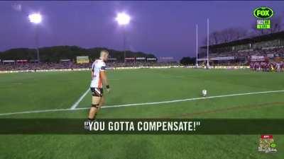 Fan has some fun with Adam Doueihi as he is kicking for goal