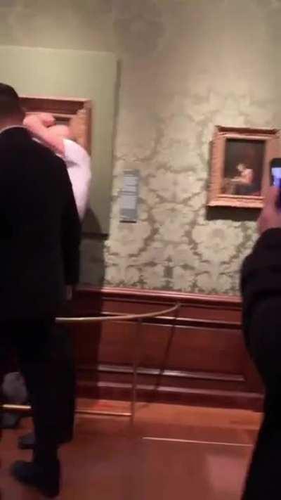 Dutch police have arrested eco activists in The Hague after a protester attempted to glue his head to Vermeer's Girl with a Pearl Earring