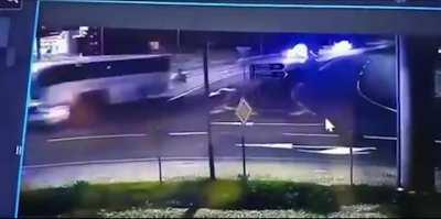 Emigrants Hit Police Cars on Bus