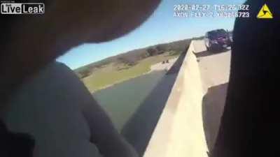 Cop Stops a Suicidal Woman From Jumping Off a Bridge