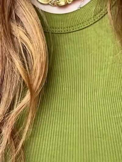 Showing off her necklace