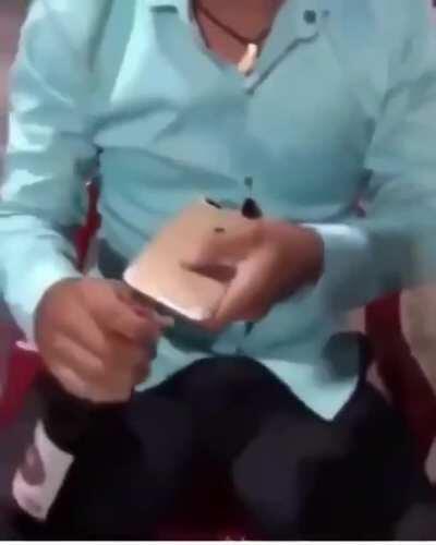 Lets use my phone as a bottle opener