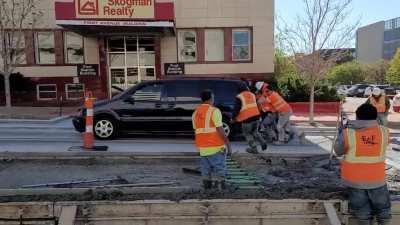 Idiot ran out of gas at the bottom of the hill in a one lane construction site and concrete workers had to push her up the hill while her boyfriend didn't get out of the passenger seat.