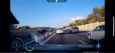 A driver in my city illegally crossed a barrier into the express lane, got rear ended causing their dog to get ejected out of the trunk. Dumbass. Full credit to /u/ninepound!