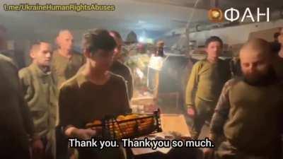 Evgueny Prigozhin the head of Wagner PMC visited Ukrainian prisoners of war on New Year's Eve to greet them and offer them a traditional gift of Tangerines.