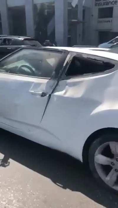 Idiot on his phone while driving a motorcycle in Beirut, Lebanon