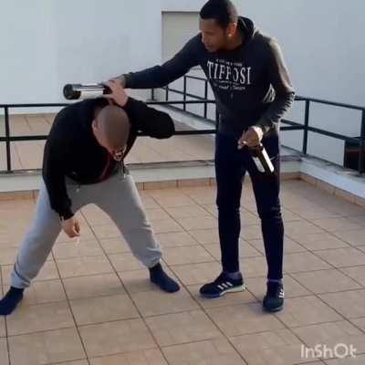 WCGW trying to appear to be tough getting a wine bottle broken on his head