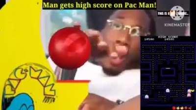 Man gets high score on Pac Man!