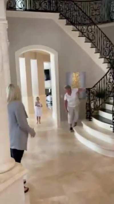 Grandparents come to see the new baby for the first time.