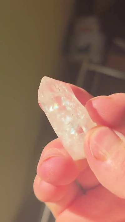 Natural rainbow included clear quartz crystal