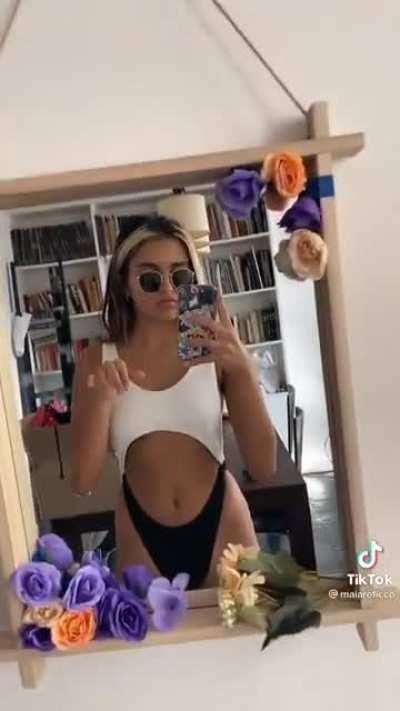 she really loves summer, and we love her in bikinis