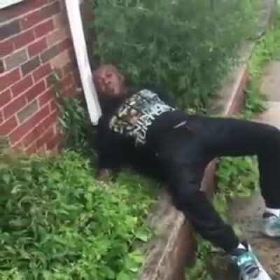 Man singing walking out to a drug deal and passed out man on his lawn.