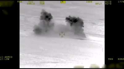 American M777 howitzer scores a perfect hit on a group of militants planting a IED