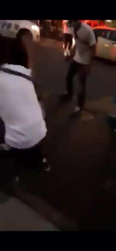 NYPD cop gets put in a headlock after lunging and attacking a bystander