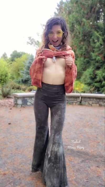 Petite nymph-o pinching her nips at the park 😋