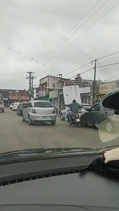 transporting your new massive TV with a motorbike