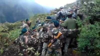 Old video of Indian and PLA soldiers having a scuffle over the mountain borders of Arunachal Pradesh , 2009