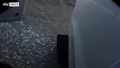 Journalist takes 2 rounds into their body armour at a checkpoint