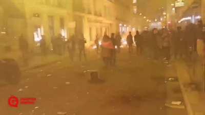 Paris tonight after Macron used a constitutional power to pass controversial law about the retirement age without a parliament vote. Rise Up.