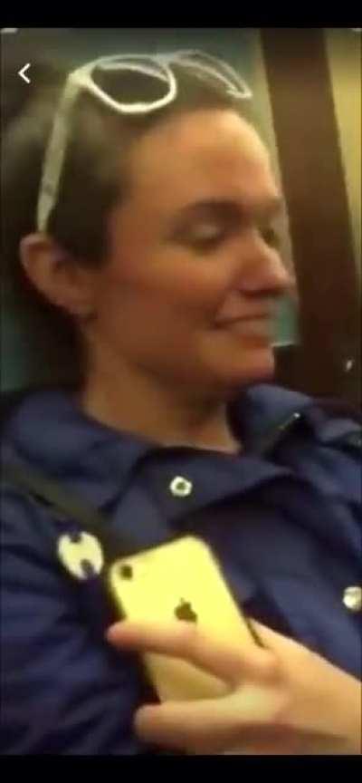 Guys share blunt on NYC subway