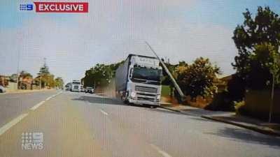 Out of control truck crashes through intersection, poles, bus shelter and fences before finally stopping with no injuries Adelaide, Australia 28 Feb 2023