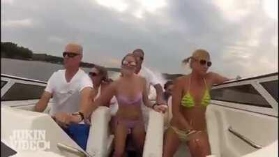 Angry bald dude driving a speed boat