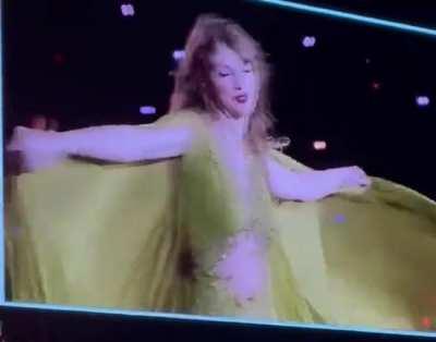 Taylor dancing and wearing a new stage outfit tonight