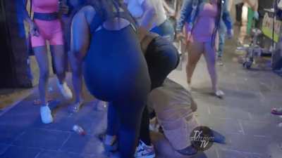 Street brawl in Austin, Texas. Wigs go flying.