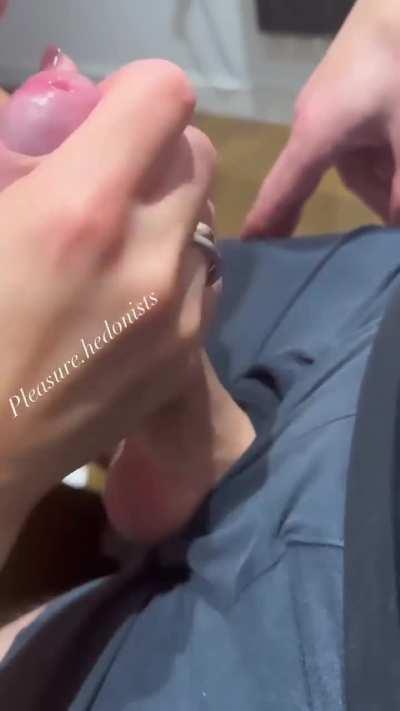 Licking it like a lollipop until he explodes