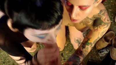 Working as a team to receive a delicious cumshot.