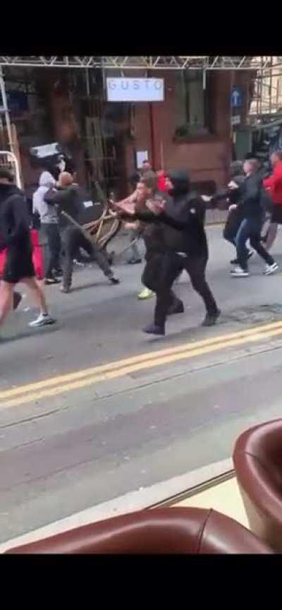 Current scenes outside Old Trafford. Leeds United and Man United fans scrapping! 👊🏼 Madness 💀