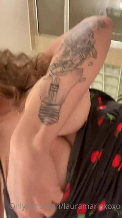 Playing with her nipples