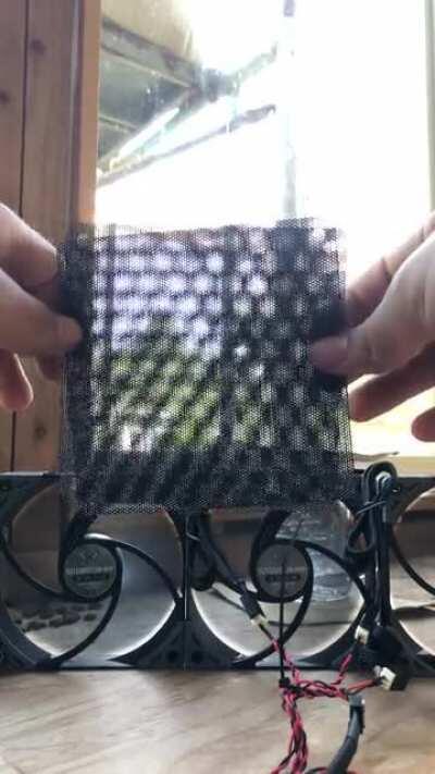 [OC] Hexagon Pattern Emerges When Two Mesh Filters Are Turned