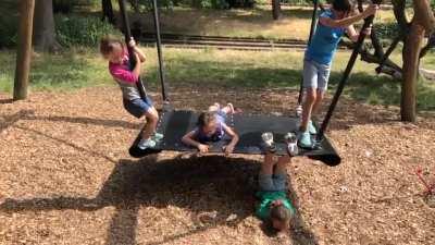A child, a swing, a fullscorpion