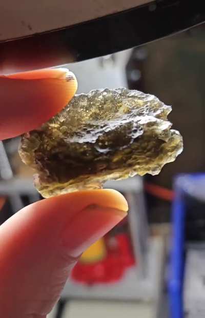 Rare greyish olive green shade of moldavite. I've only ever had a few decent size ones with this color shade.