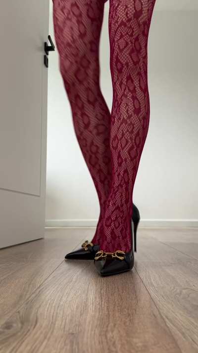 red body fishnet with heels..looks very extravagant